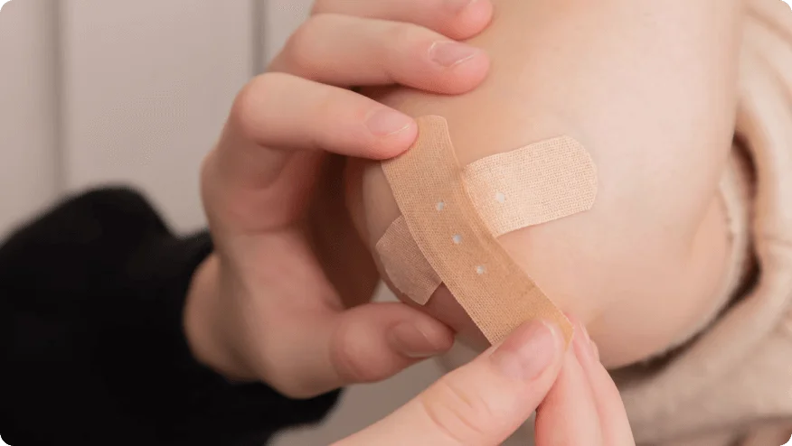 a person holding a wooden block