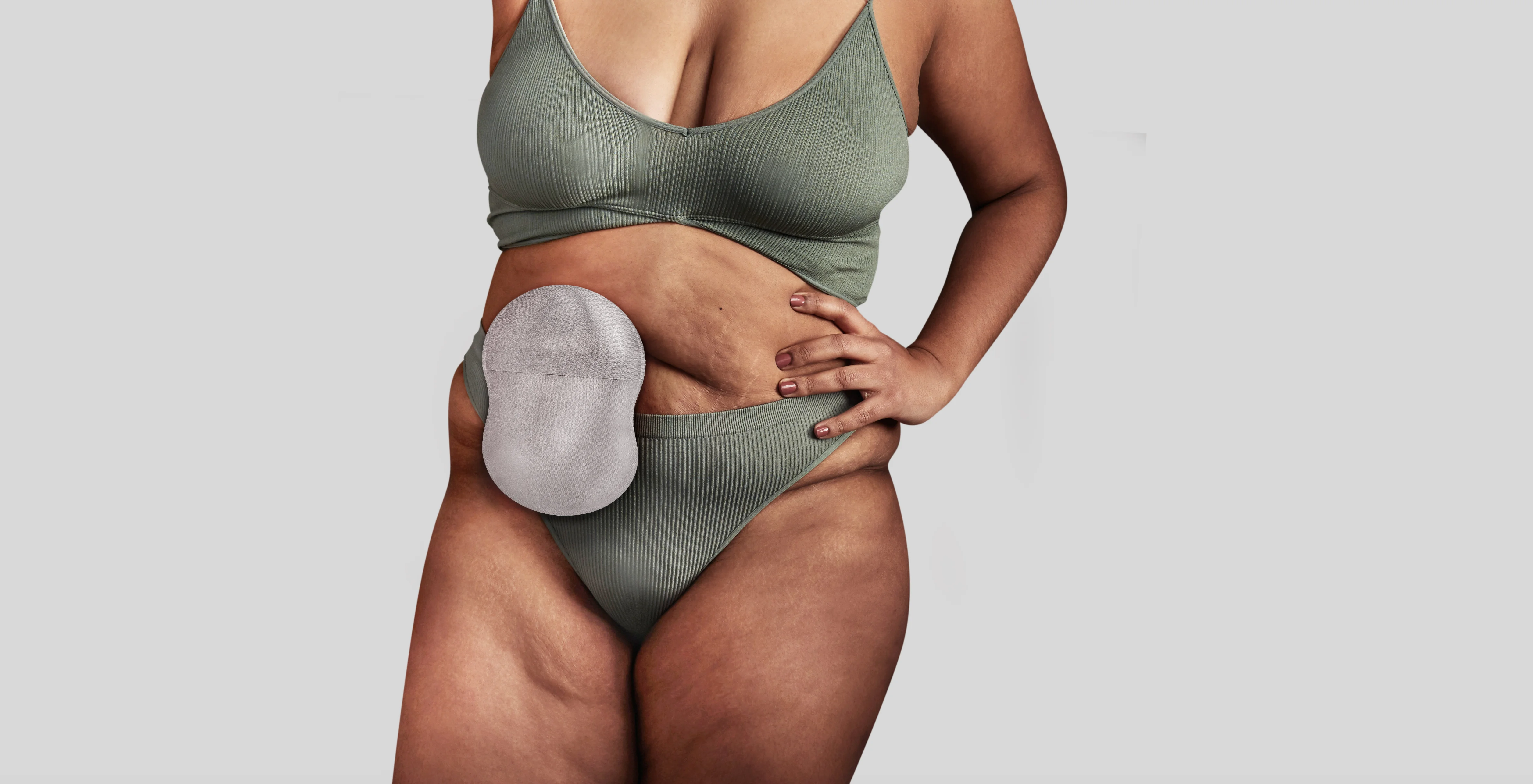 woman wearing Esteem body 8 shaped ostomy pouch 